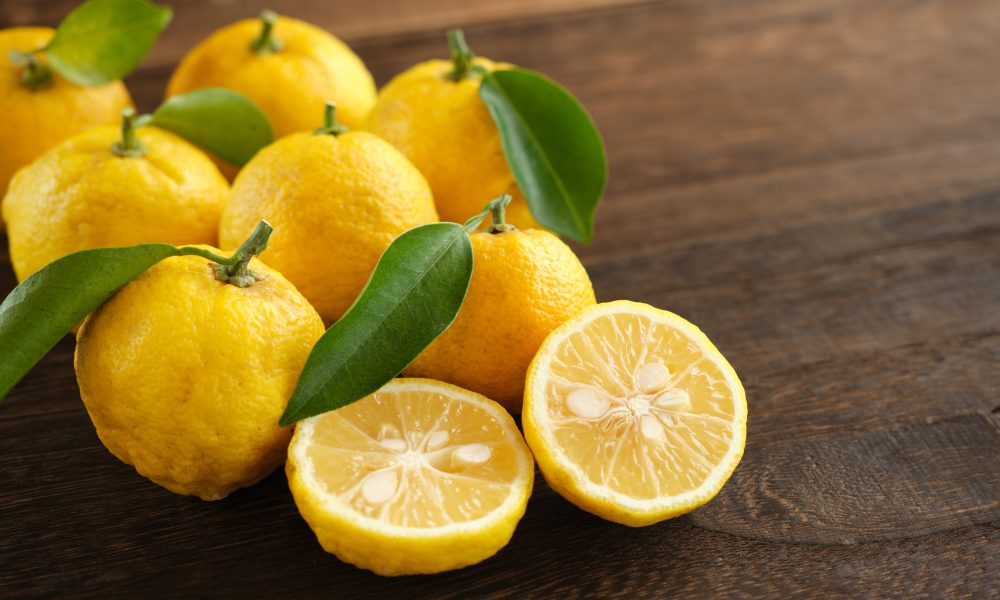 Japanese,Yuzu,Fruits,Placed,On,A,Wood,Table